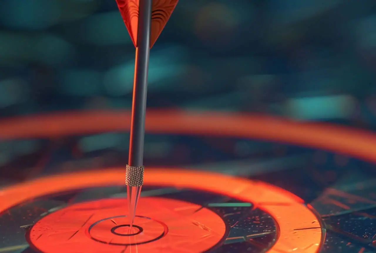 rode dartpijl staat rechtop in bullseye